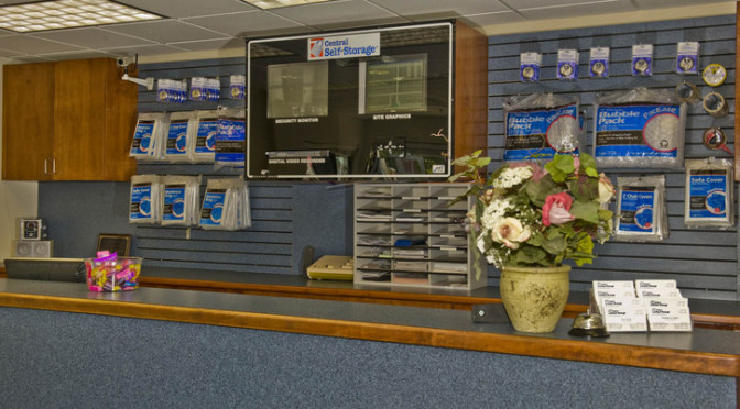 Facility office overlooking the front desk with moving and packing supplies available