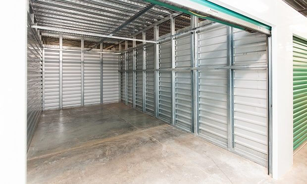 View inside a large, clean storage unit with no belongings