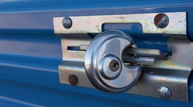 a disc lock on a blue self storage door