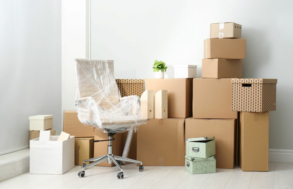  Large items like these boxes and chairs can be put away in a storage unit to clear up space.